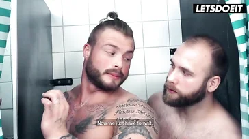 Busty blonde has a threesome with two strangers in a hostel