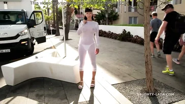 Naughty Lada walks around Spain in some see-through lingerie.
