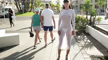 Naughty Lada walks around Spain in some see-through lingerie.