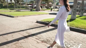 Naughty Lada walks around Spain in some see-through lingerie.